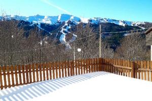 Monolocale panoramico con giardino in Abetone