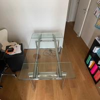 Tavolo in vetro allungabile con gambe in acciaio