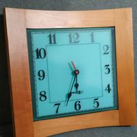 Orologio a muro con cornice in legno massello