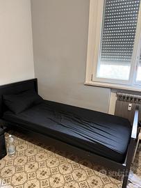 Coppia letti a piazza singola con materassi