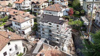 Nuovo quadrilocale con giardino a Laives