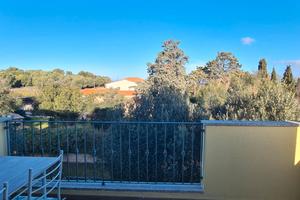 Bilocale luminoso con veranda e posto auto