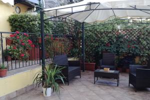 Bilocale con giardino in centro