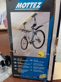 solleva bicicletta Mottez blocco automatico 
