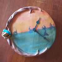 Simpatico orologio in terracotta da parete