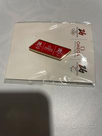 Spilla Omega olimpiadi 2026