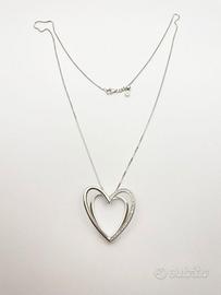 Collana oro 18KT con diamanti a scritta COMETE.