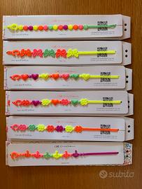 Braccialetti Cruciani fluo