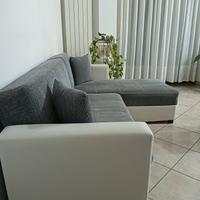 divano con penisola a sinistra 