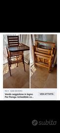 Seggiolone in legno della Per Perego richiedibile 