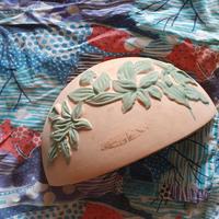 Appliqué da esterno in terra cotta