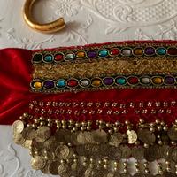 Cintura e bastone per danza del ventre