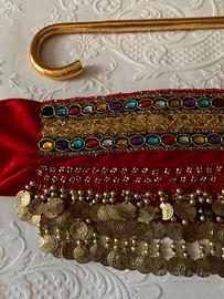 Cintura e bastone per danza del ventre