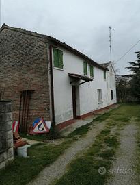 Casa con terreno recintato