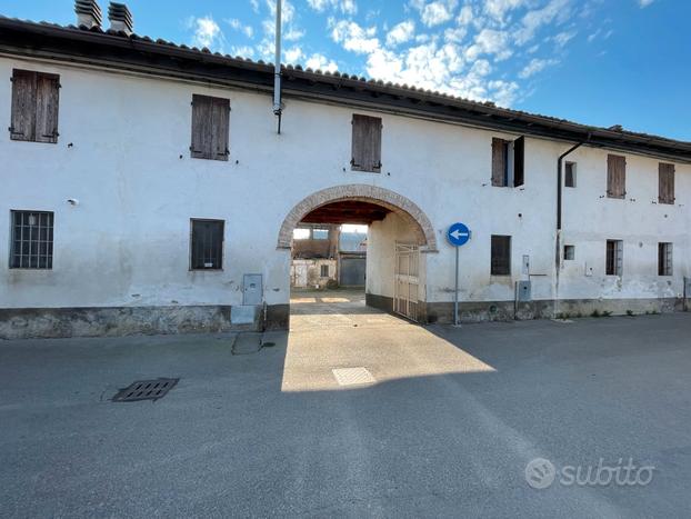 Porzione di fabbricato con area edificabile