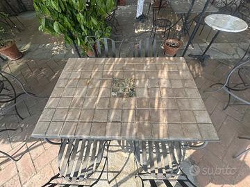 Tavolo in ferro con piano di cotto