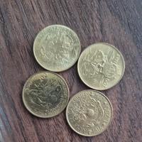 Quattro monete da duecento lire commemorative