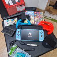 Nintendo Switch Oled con giochi e accessori