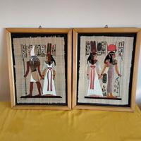 2 quadri con cornice, e pergamena egiziana 