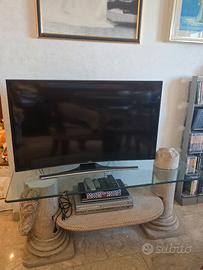 Tavolo porta TV in pietra e vetro