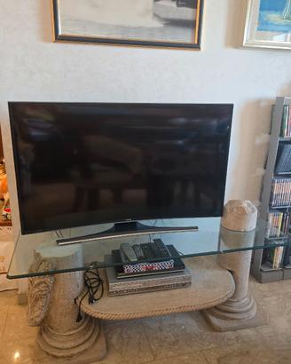 Tavolo porta TV in pietra e vetro