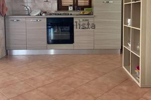 Piano rialzato arredato