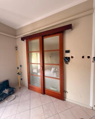 Porta scorrevole in legno