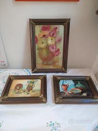 Tre quadri con cornice in metallo 