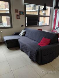 Divano letto con penisola