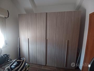 Cucina, camera matrimoniale, parete attrezzata e c