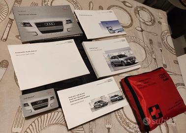 Audi manuali completi + kit soccorso originale. 
