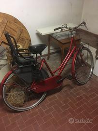Bicicletta da donna con portabimbi posteriore