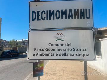 Ville a schiera bilivelli con giardino posto auto