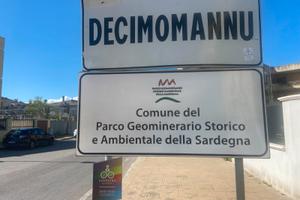 Ville a schiera bilivelli con giardino posto auto