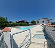 appartamento-bilocale-con-piscina-e-posto-auto