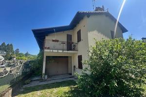 Casa singola con ampio giardino e terreni
