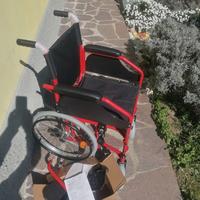 Carrozzina pieghevole invalidi