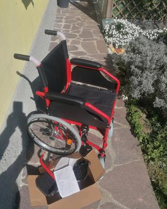 Carrozzina pieghevole invalidi
