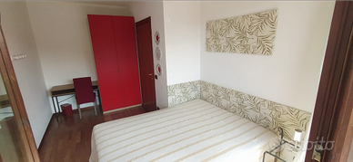 Luminoso camera con balcone