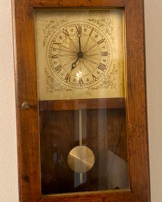 Orologio a pendolo in legno