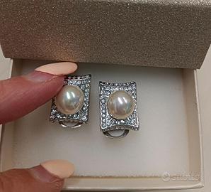 Orecchini clip acciaio diamanti e perla centrale