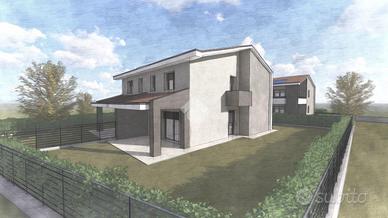 PORZIONE DI BIFAMILIARE A PESCANTINA