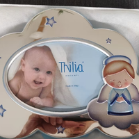 cornice argento nuova marca thilia con angioletto