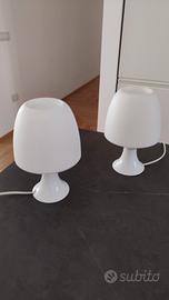 Coppia di lumi da comodino 