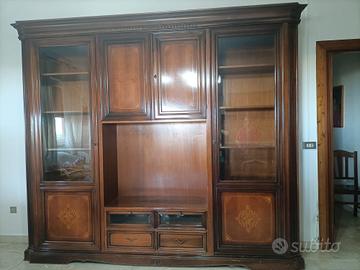 parete attrezzata e divano letto