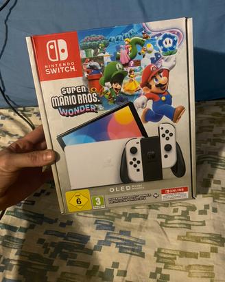nintedo switch oled+ accessori e giochi
