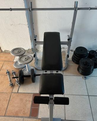 Panca + bilanciere + 5 manubri + 33 pesi