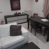 Parete attrezzata ,madia, tavolo calligaris divano