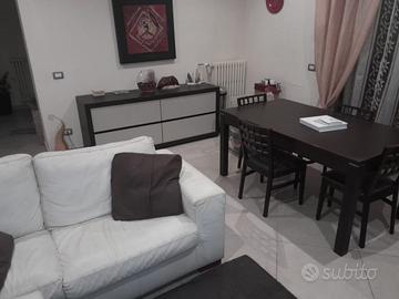 Parete attrezzata ,madia, tavolo calligaris divano