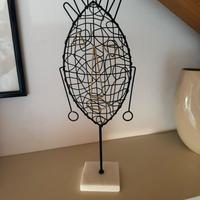 Scultura metallo nera e oro